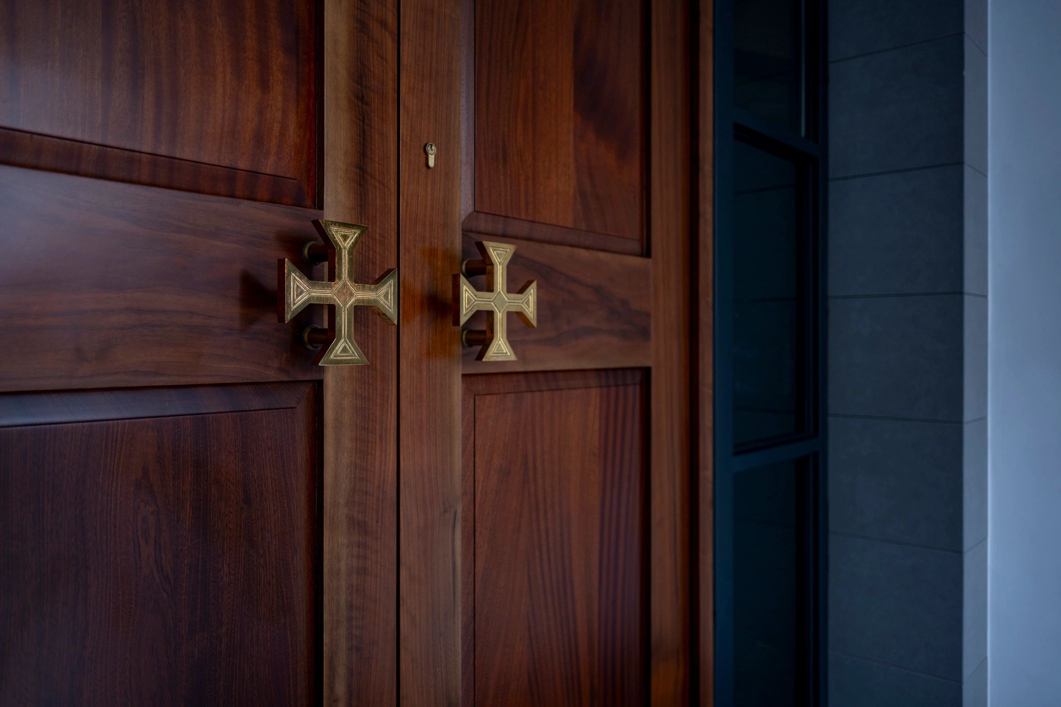 Detailed brass handle on wooden door